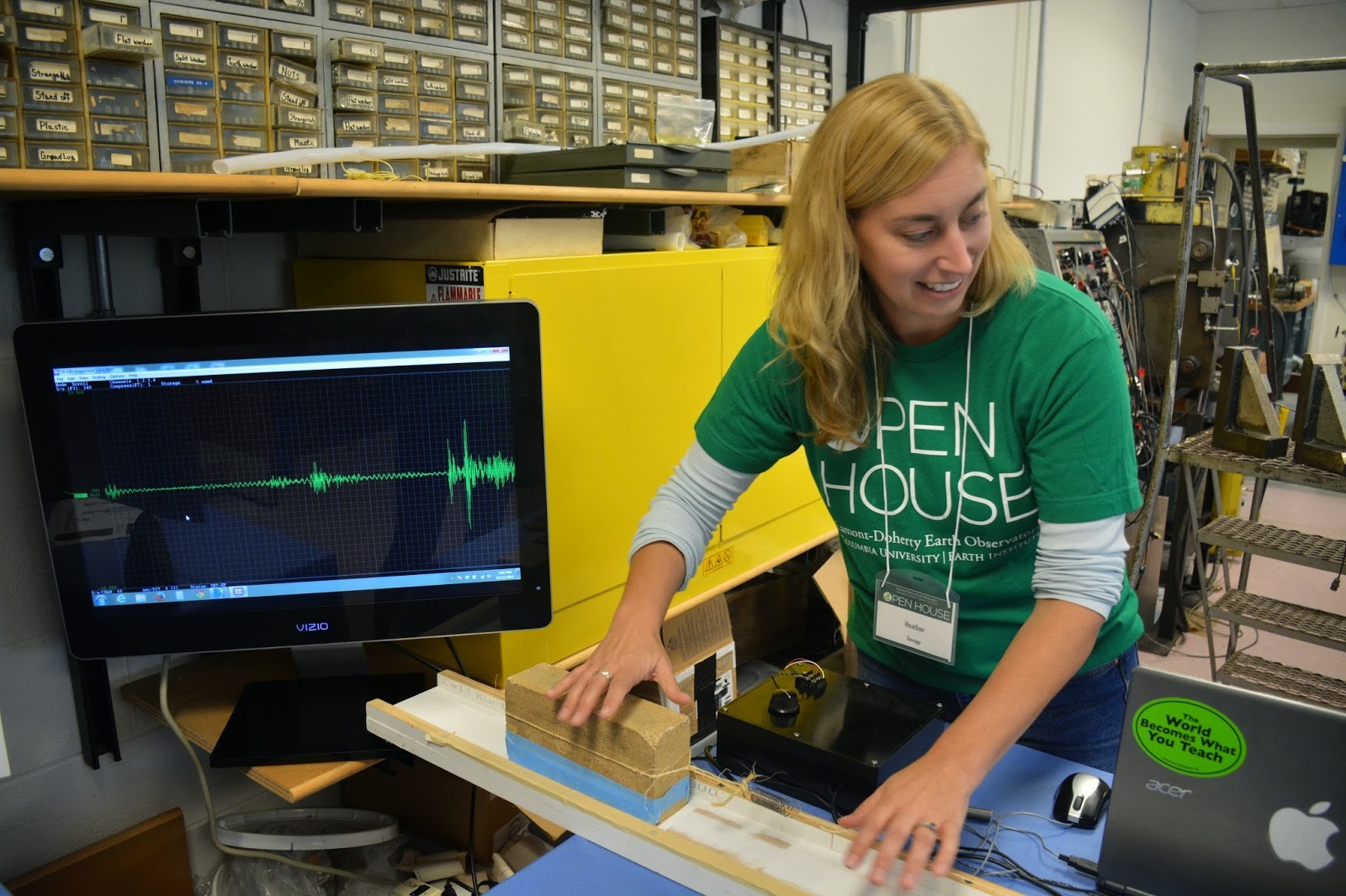 Heather Savage makes earthquakes happen with slider block set up at Lamont Open House (2014).