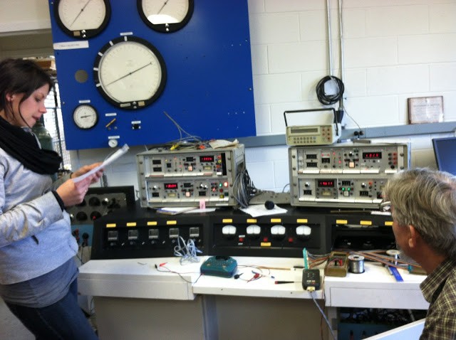 Visting researcher Mandy Duda and Ted Koczynski compare notes at the triax command center (2012)