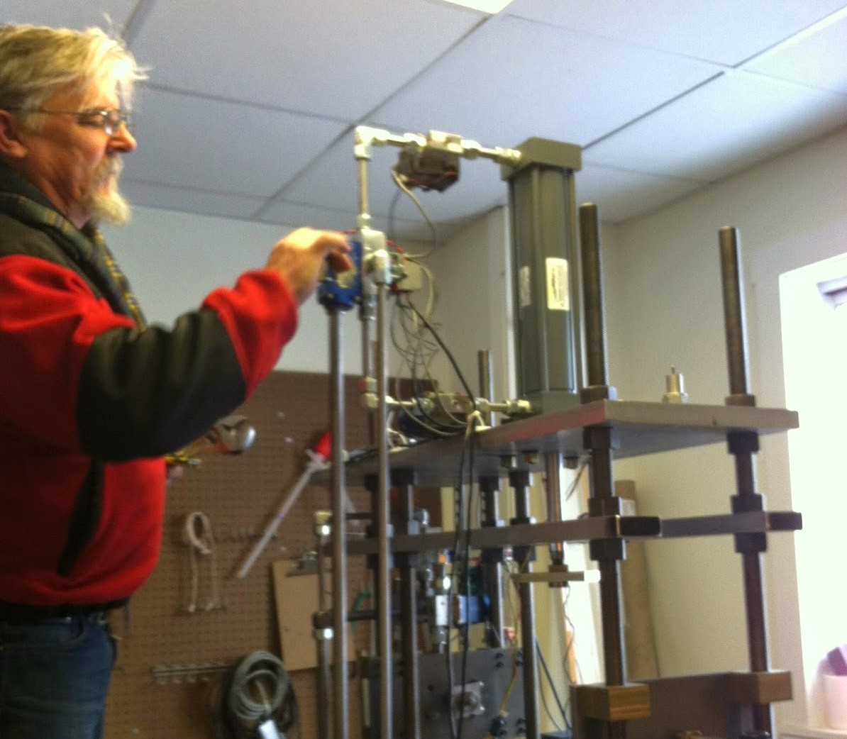 Ted Koczynski adjusts the solenoid valve on the new cryogenic biax (2014).