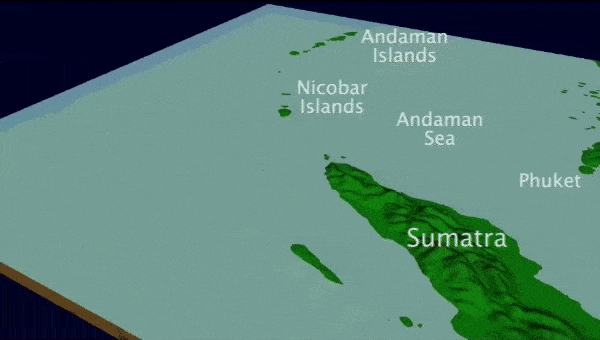 Animation of tsunami waves propagating and moving across the ocean surface and impacting island land masses.