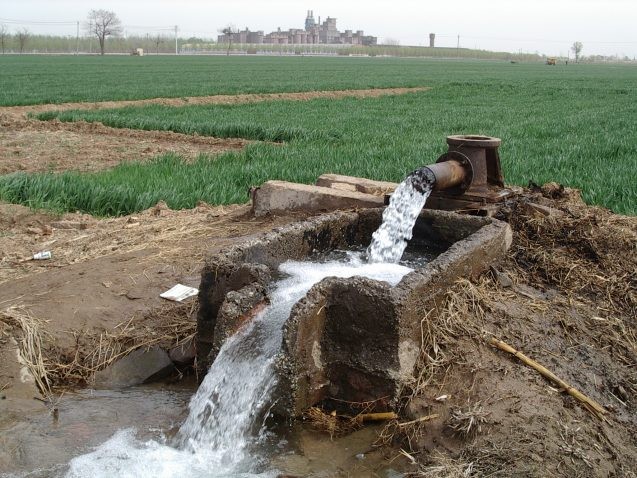 Ancient groundwater flows from a well in the North China plain. Credit: Werner Aeschbach