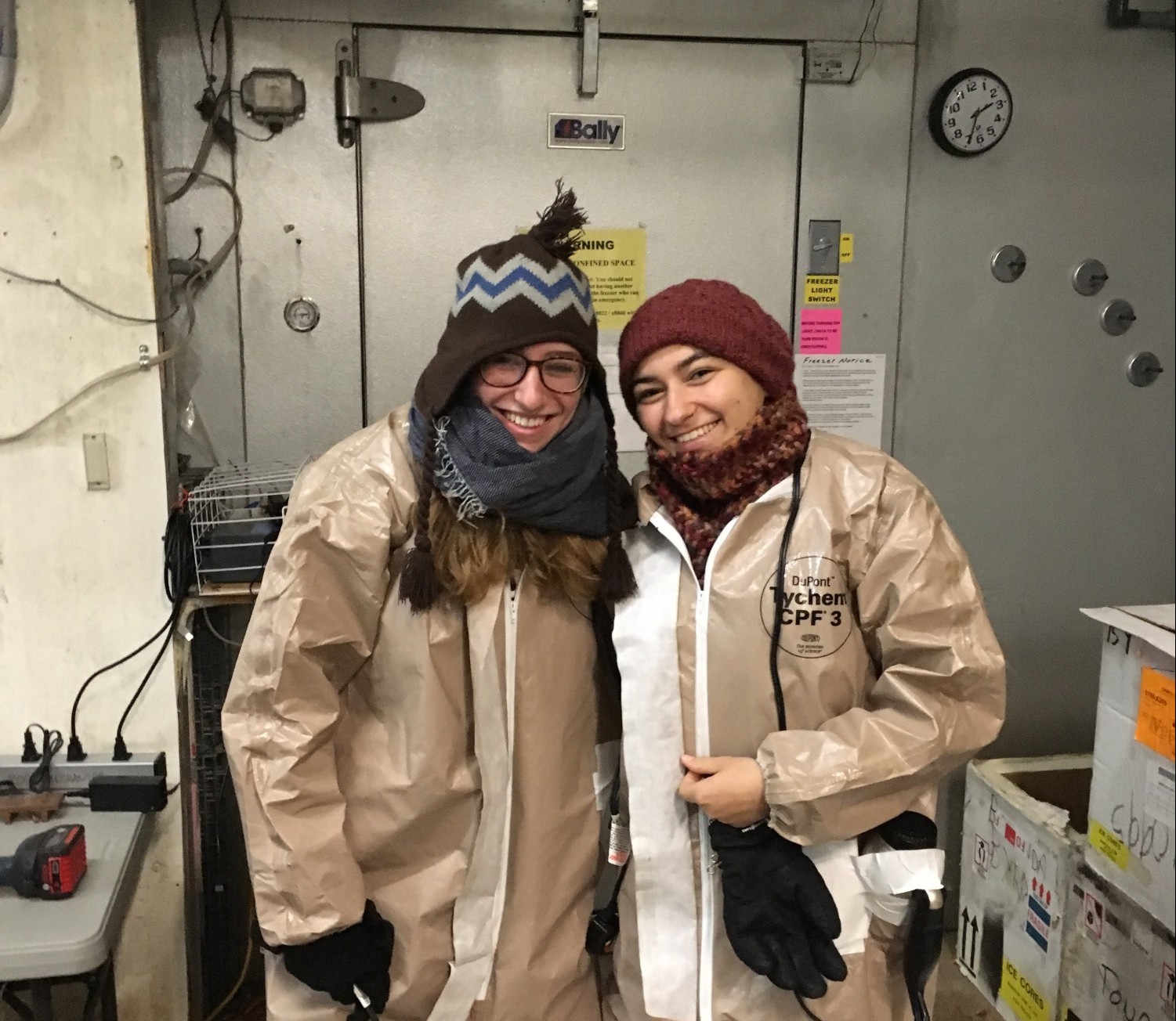 Visiting Brown undergrads Allie Coonin and Jessica Minker wear "warm suits" to make samples in the cold room (2018).