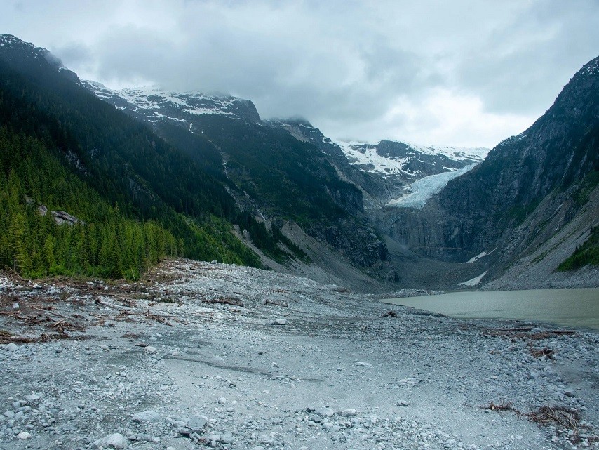 Aftermath of the November 2020 Elliot Creek landslide and tsunami, looking upstream to the landslide debris and West Grenville Glacier. In the 1960s, the glacier extended to the point where this photo was taken. Credit: Brian Menounos/University of Northern British Columbia
