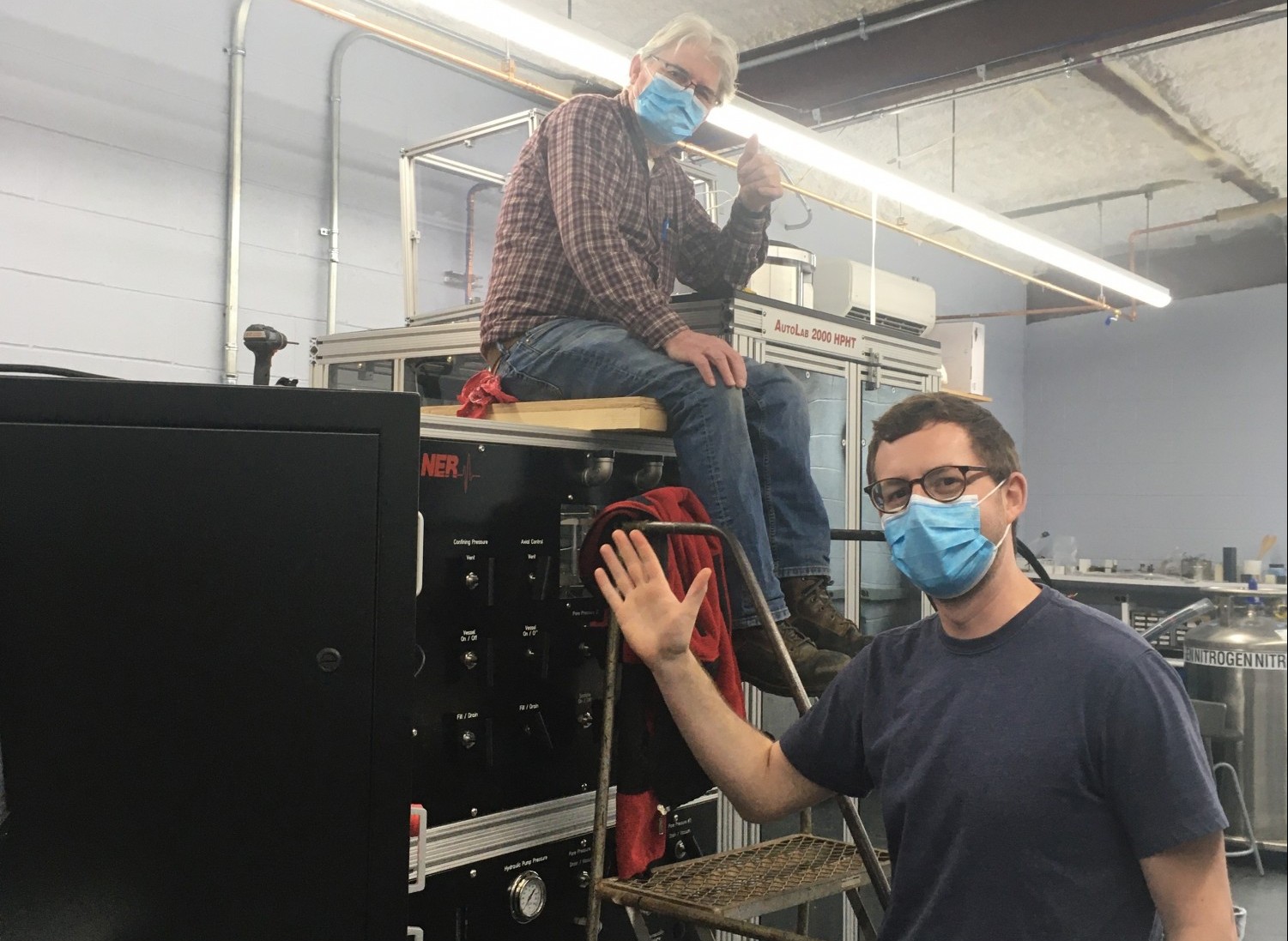 Jake Tielke and Ted Koczynski work on the triaxial apparatus from NER (2021).