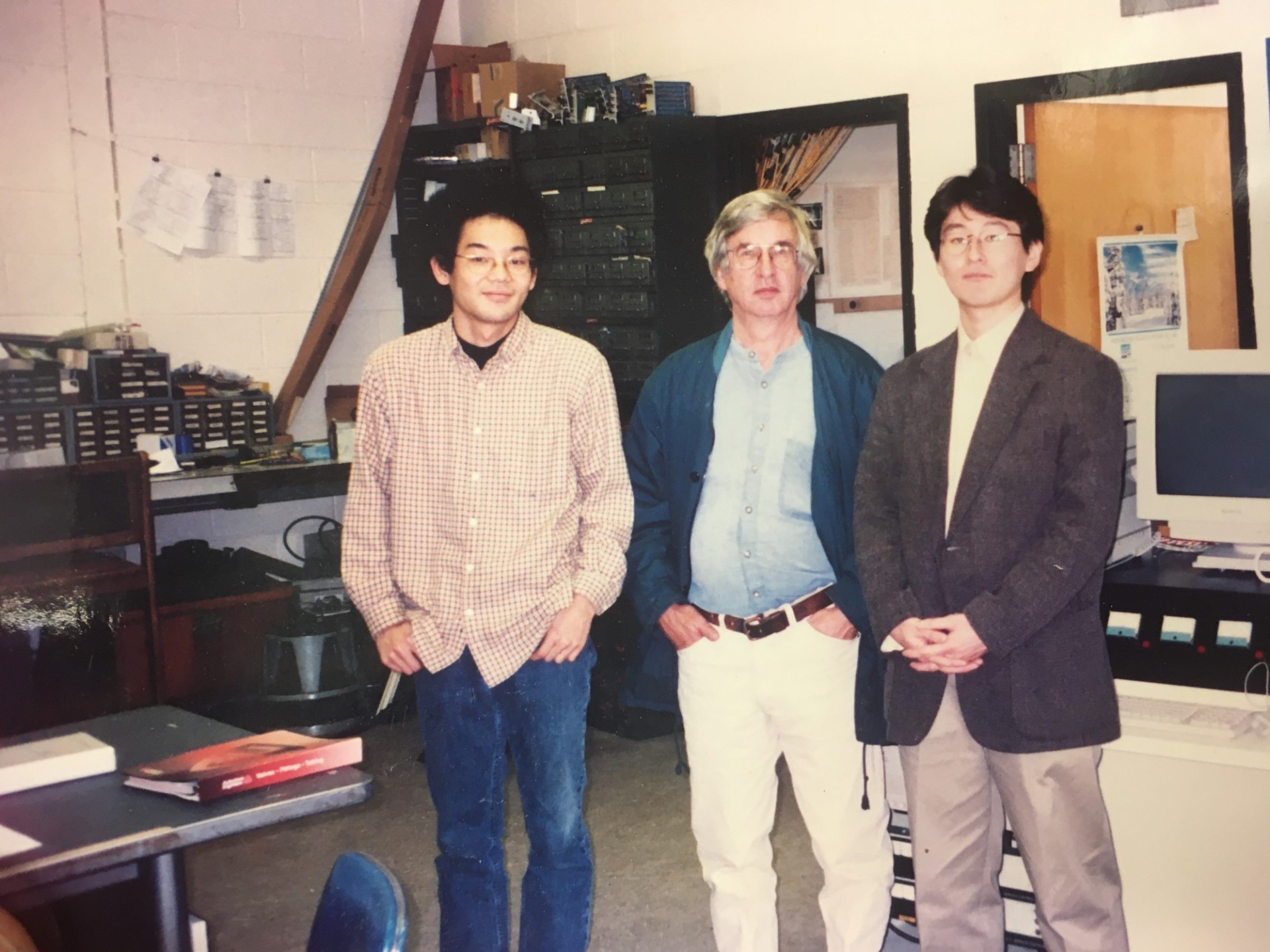 Masao Nakatani, Chris Scholz, and a visitor in the lab (~2004).