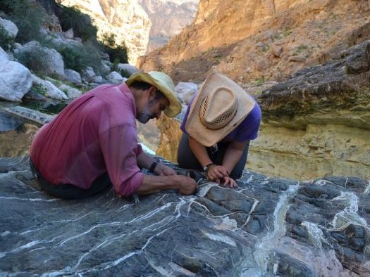 Peter Kelemen and Team Examine Carbonate Veins in Mantle Rock - Credit: Kevin Krajick
