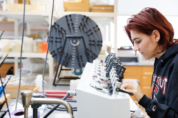 Credit: Sirin Samman Photography Scientist preparing sediment core samples