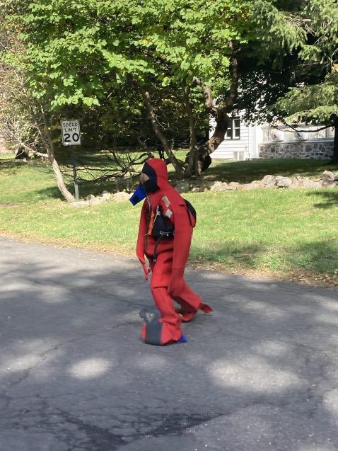 child in gumby suit