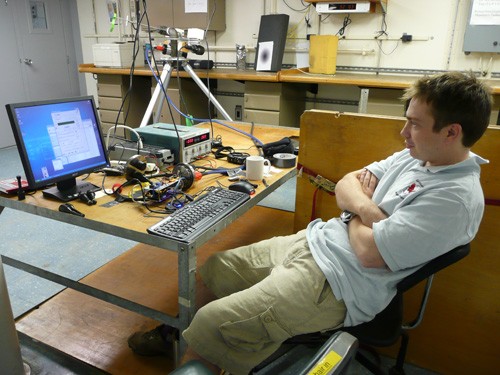 Carl Robinson of the British Antarctic Survey waiting patiently as the code he wrote to control the camera system does what it is supposed to do.