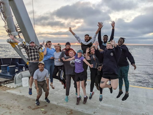 stemseas participants jumping on deck of ship