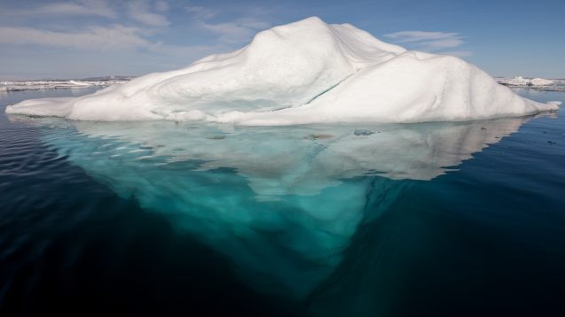An iceberg in the Arctic with underside visible