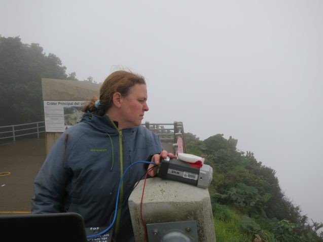 Einat Lev at the viewing platform at Poas volcano with an infrared camera, which maps surface heat. 