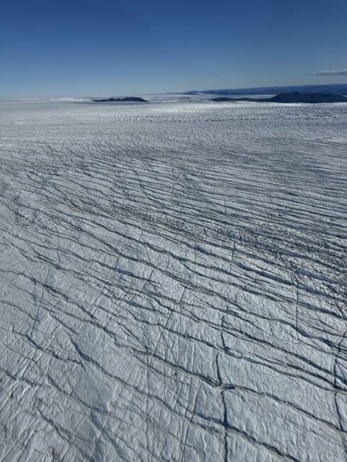 Aerial view of crevasses nearby the edge of the ice sheet