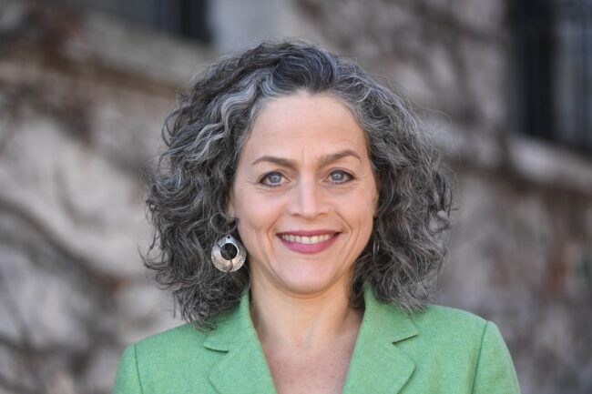 A headshot of Lisa Dale, lecturer in climate at the Climate School