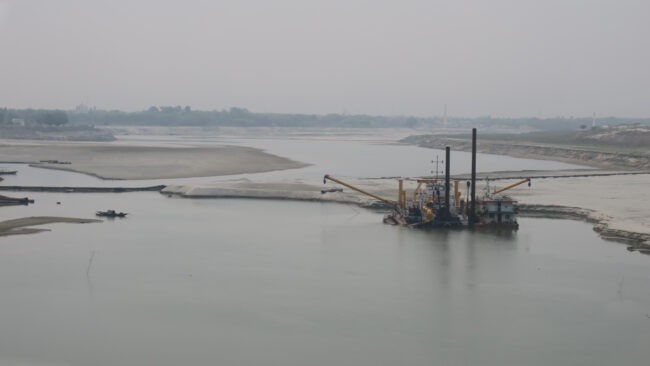 Dredge in a river