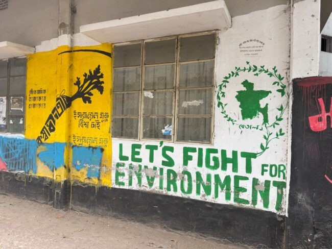 Sign in Bangladesh that says &quot;Let's fight for environment&quot;