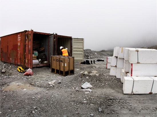 Researchers are sorting and testing equipment that has been trucked up to a staging site at the Grasberg mine (which is socked in by fog most of the time). The helicopter will make the final airlift to the glacier. (Images courtesy Freeport McMoRan.)