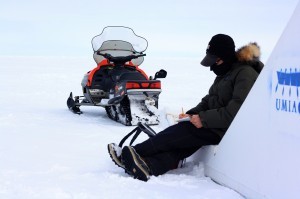 Scientist Andy Juhl makes notes at our first field site about snow depth and distribution.
