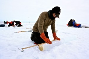 Andy Juhl measures and creates a temperature profile for each core drilled from the ice. 