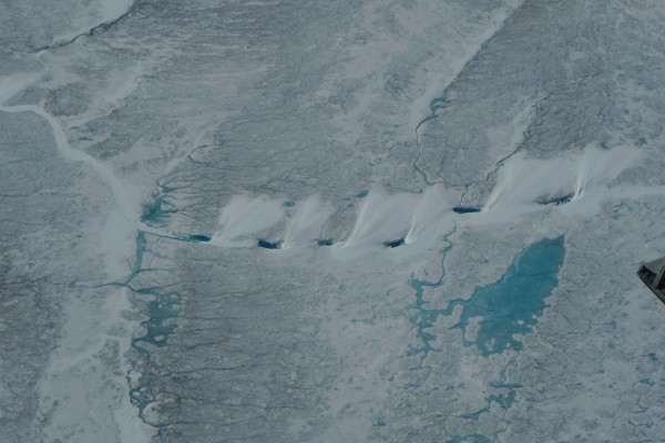 Surface feature on the ice that appears to be a meltwater channel that has been covered over by blown snow. (Photo M. Turrin)