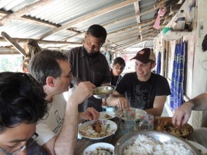 Mr Islam serves Scott and myself more of the delicious lunch they had prepared. Eaten with our hands, of course.