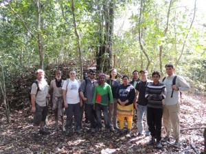 The group that made the trek to the temple pose in front of the ruins of the house (bari) that the people lived in.