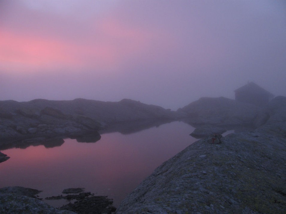 At 11pm, the clouds momentarily cleared, revealing a spectacular sunset and a rocky ridge leading to the Gjegnabu shelter, a cozy home for the night. (Templeton)
Norway 12