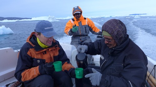 Dave Porter and Magnus Petersen enjoy a koffemik while Gabriel navigates with the GPS (Photo M. Turrin)