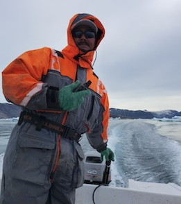 Gabriel Petersen navigates through the ice with the GPS (Photo M. Turrin)
