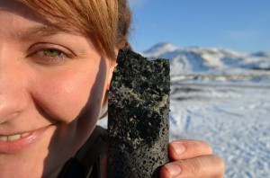 Underground, carbon dioxide disperses through volcanic basalt, and solidifies into a substance similar to limestone. A geologist shows off a core taken from the injection zone.