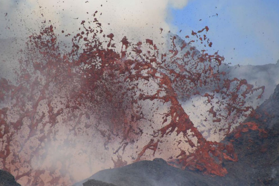 Here spatter is thrown hundreds of feet into the air. The spatter is made up of hot, plastic red lava. lava closeup 960