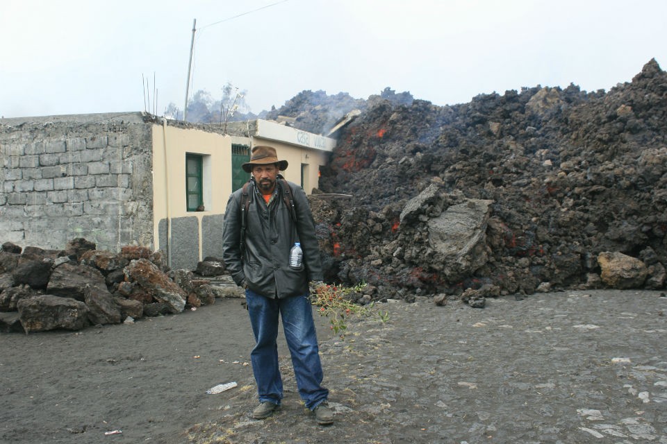 On the 11th day of the eruption, lava reached the village of Portela. In minutes, it had destroyed the home of Zé António, who often hosted geologists visiting the island to study the volcano. man w lava 960
