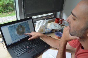 Yaakov Weiss inspects the digitized image of one of the many diamonds he has analyzed.