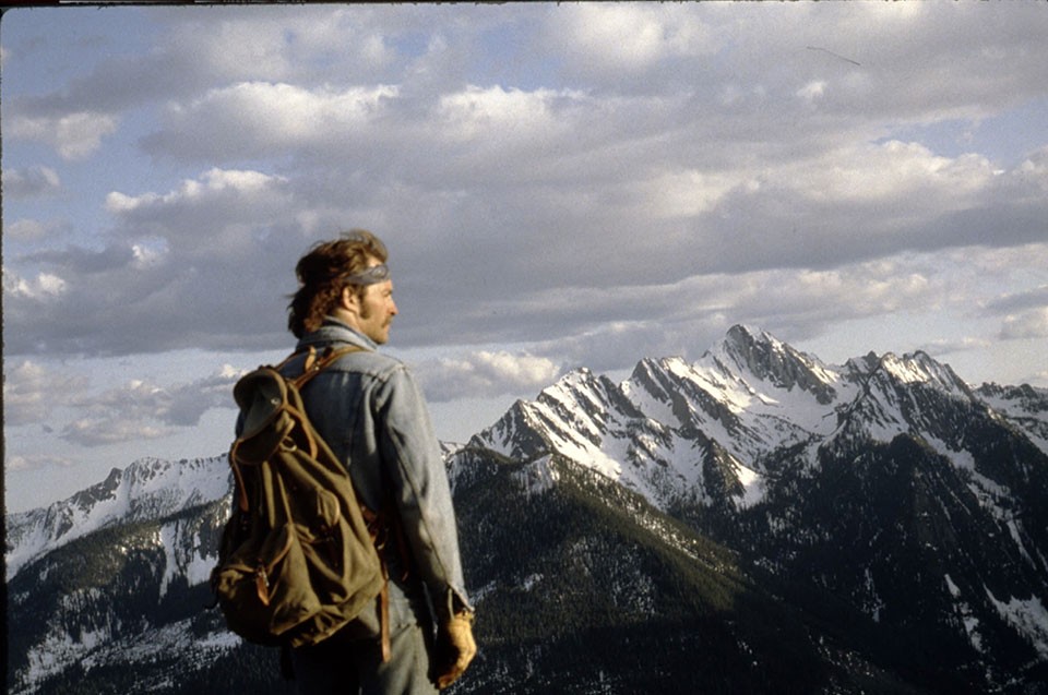 In 1980s and 1990s, prospecting teams worked their way northward through remote terrains, including the Canadian Rockies, where this crew member was landed by helicopter. (Courtesy Paul Derkson) 12