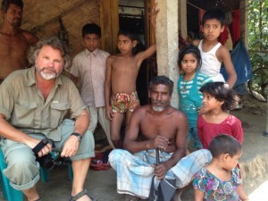 Chris interviewing Bangladeshi farmers about the history of the area