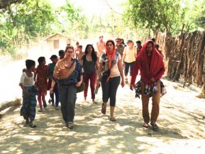 Walking back to the ship after a successful visit to a prosperous Bangladeshi village
