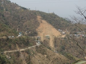 The landslide that blocks the route to the airport requiring us to take a smaller, longer, bad road instead.