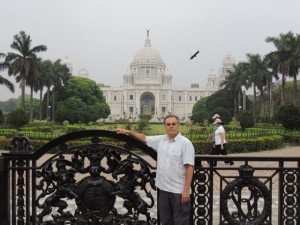 Standing in front of the gates to the Queen Victoria Memorial in Kolkata