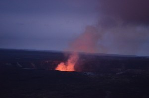 At dusk, a fiery plume dominates the summit of Kilauea, whose eruptions have formed, and destroyed, the landscape for many miles around.