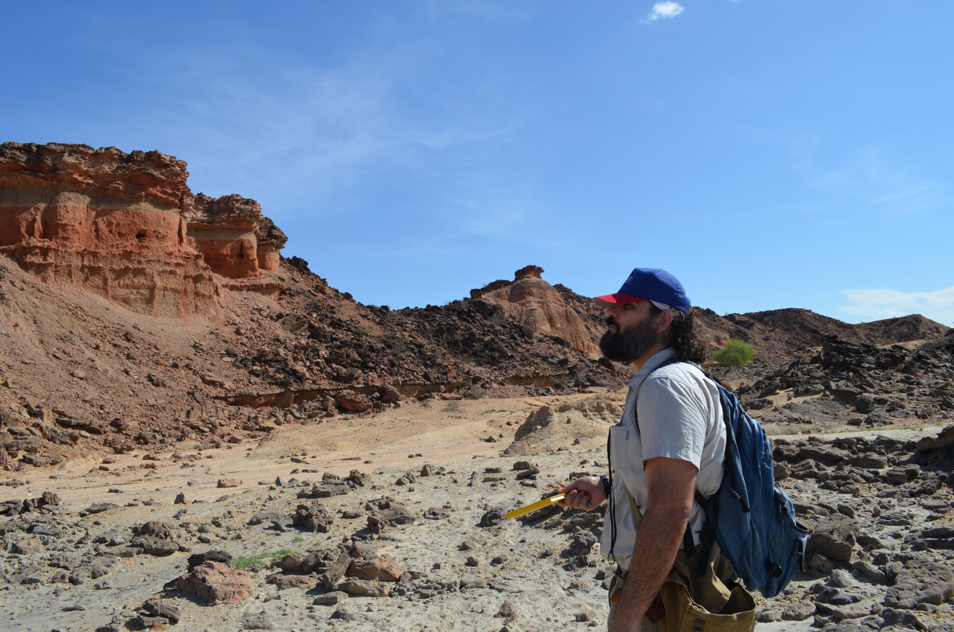 Geologist Christopher Lepre studies rocks in the Turkana region of northwest Kenya, where many of the most important fossils and artifacts from early humans are found.