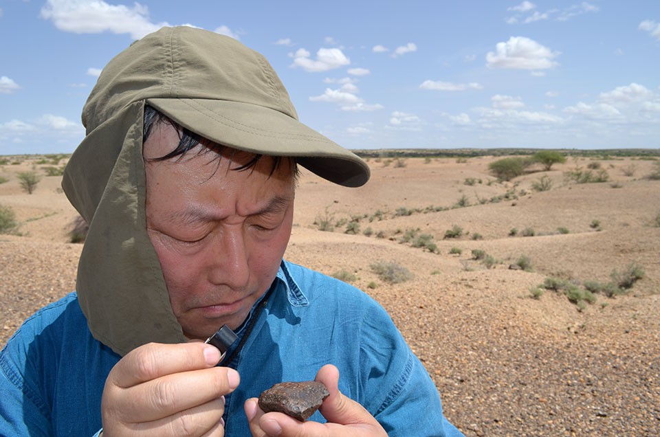 This rock has a nice varnish coating, "Look at this specimen--it's beautiful!" says Liu. 16