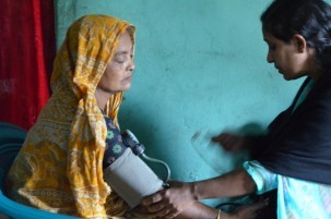 Health workers from the Araihazar clinic regularly survey participants on the long-term health study to update their condition. Photo: David Funkhouser