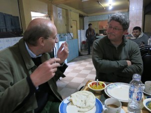 Researchers Alexander van Geen, left, and Benjamin Bostick discuss their work over dinner in a Faridpur restaurant. Photo: David Funkhouser