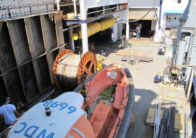 Crew members prepare the Langseth for its next expedition.