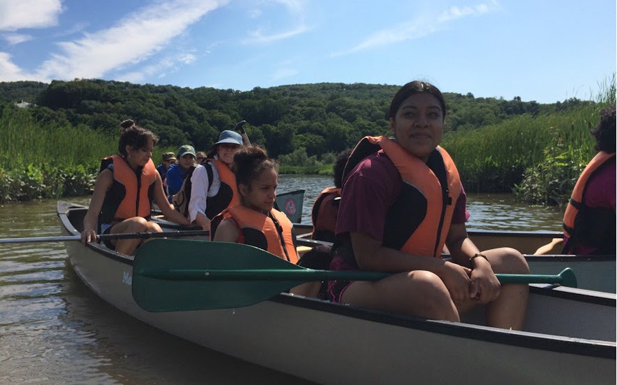 For New York City students accustomed to subways and sidewalks, the marsh required new skills beyond environmental science. Alondra Cruz paddles a canoe with Stephanie Valentin and Anjelle Martinez. SSRFP 2015 Fieldwork