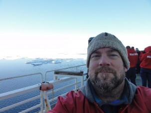 Tim Kenna captures himself in the field surrounded by Arctic sea ice. (photo credit Tim Kenna)