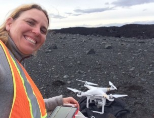 Einat Lev with Buzz, the unmanned aerial vehicle used to map the lava flow.
