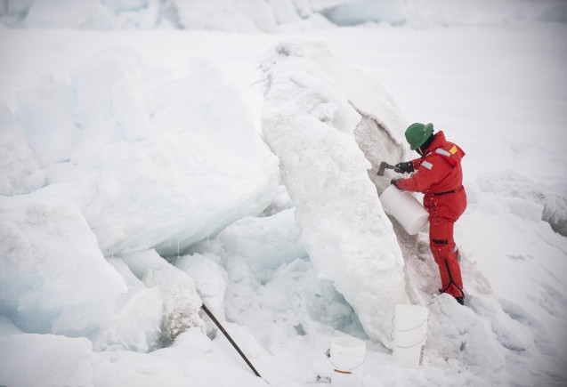 Tim sampling dirty ice. (photo C. Mendenhall). 