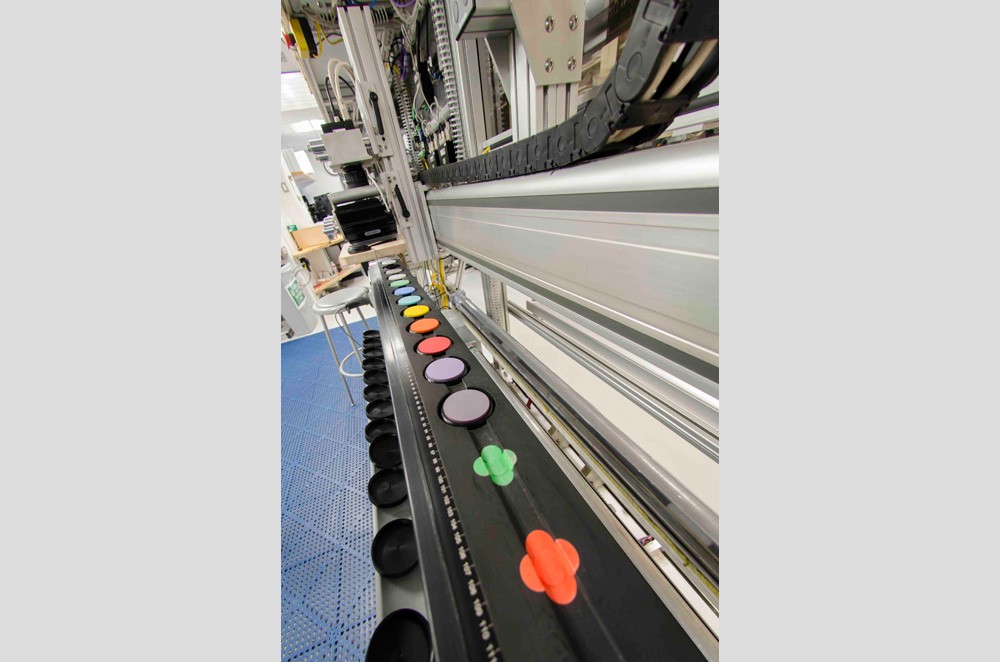 Once the cores are split, they are photographed in shipboard imaging equipment called a Section Half Image Logger. (Tim Fulton) core-imager