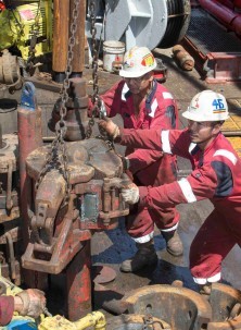 The drilling crew works with equipment aboard the JOIDES Resolution. Photo: Tim Fulton/IODP
